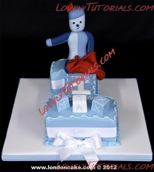 Название: 004410 First Birthday cake covered in Renshaws Baby Blue sugarpaste with a model of Iggle Piggle.jpg
Просмотров: 1

Размер: 282.2 Кб